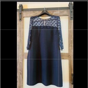 Adorable Boden navy blue dress.  Lace and polka dots on the top and back.